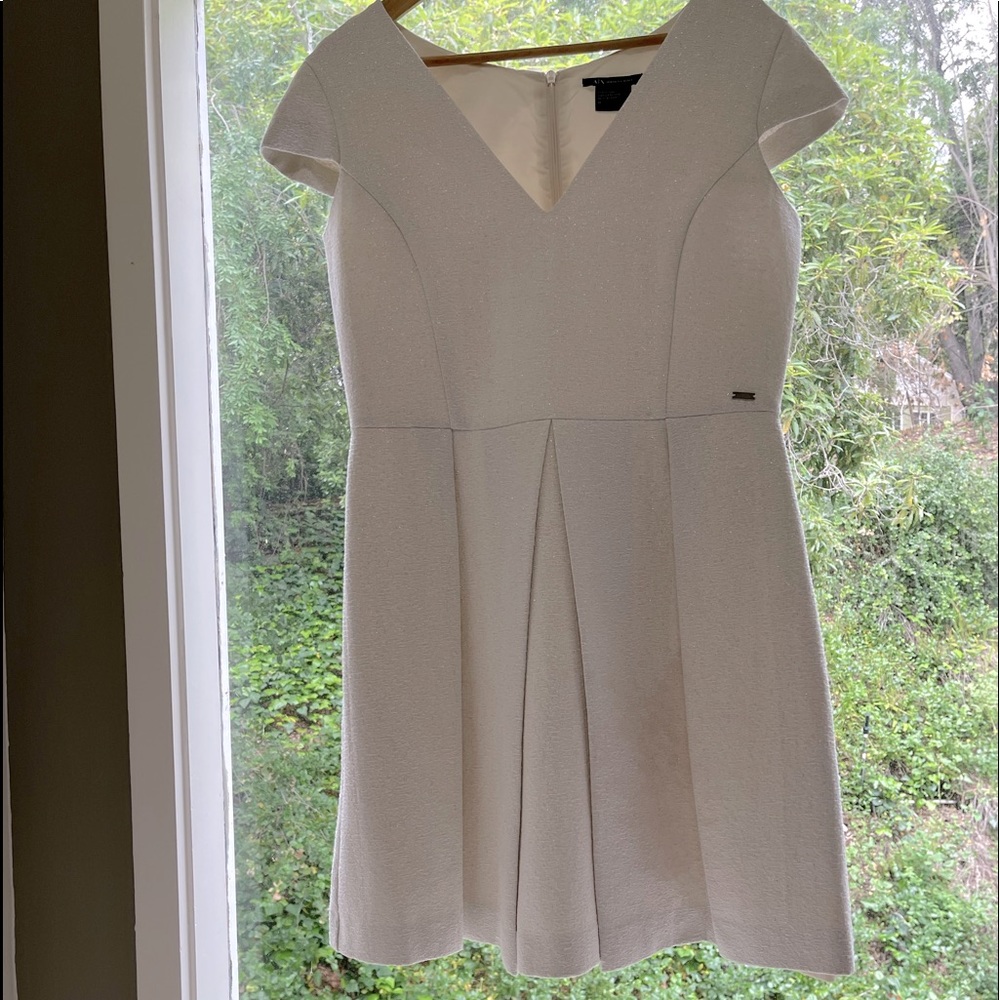 Armani Exchange size 10 (fits like 8) off white cap sleeve crepe dress w/pleats.